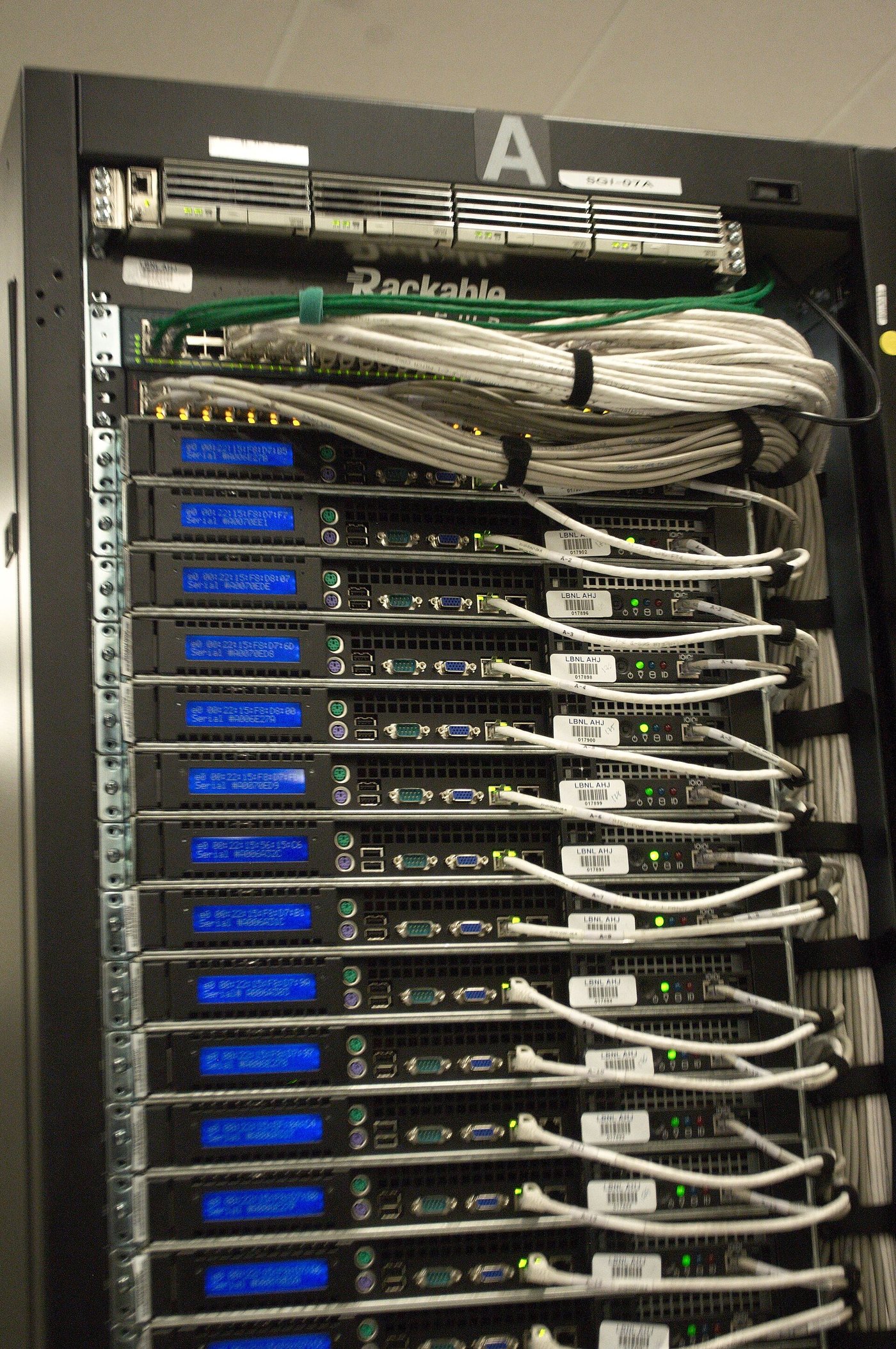 Rear of a data center rack with cabling