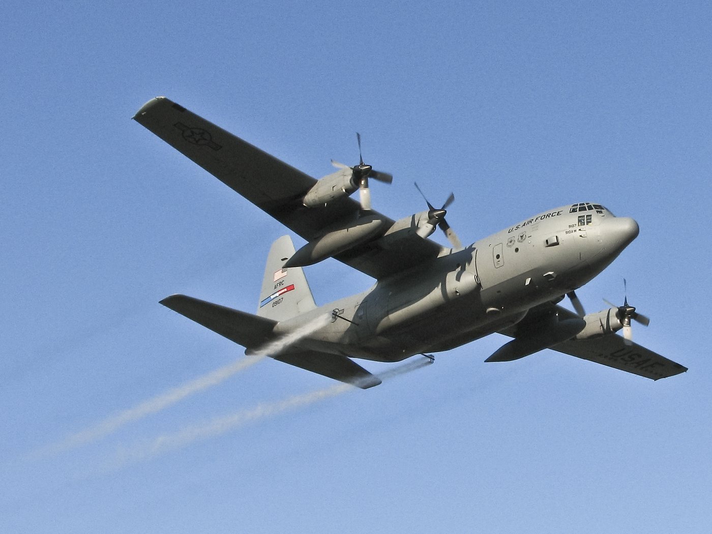 A C-130 aircraft spraying for mosquitoes