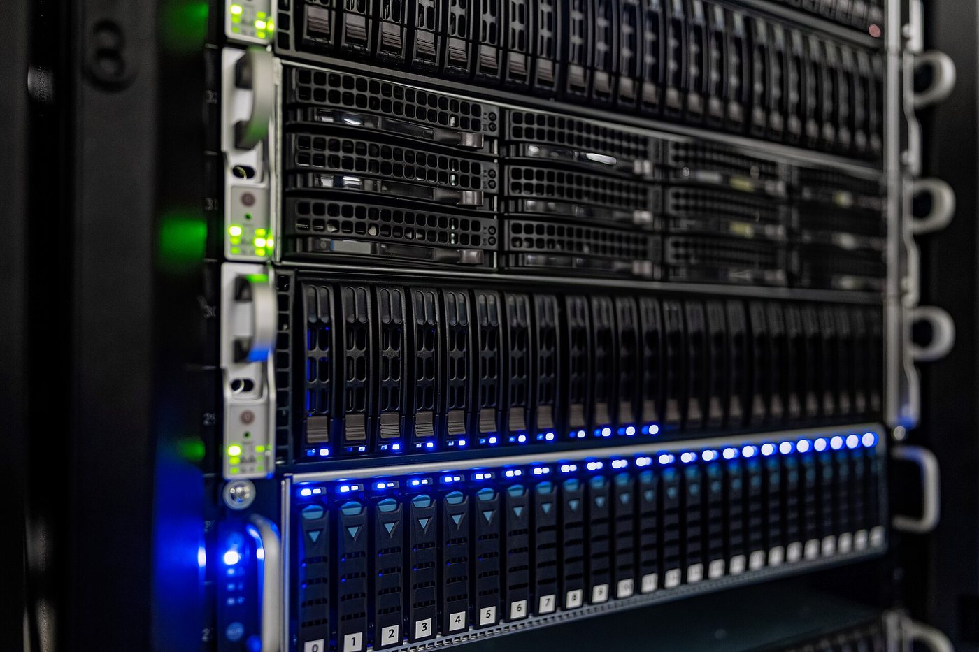 Rows of server racks with cabling