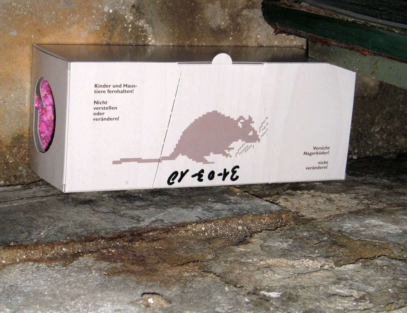 A locked rodenticide bait box